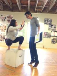 Rosemarie Kingfisher as Cobweb and James Lewis as Robin Goodfellow the Puck in rehersal. Masks by Kendra Johnson.